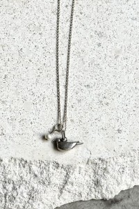 Silver necklace with bird pendant and pearl